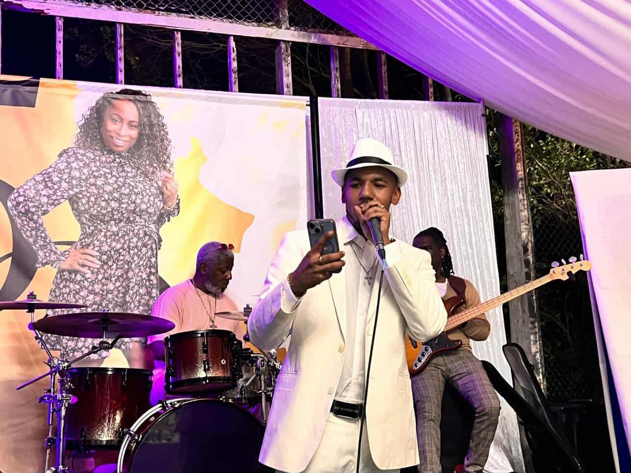 LJ emceeing on stage